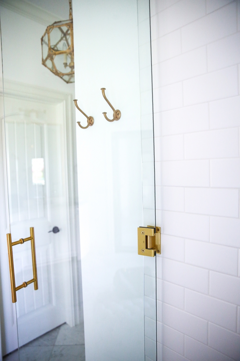white marble bathroom, pinterest bathroom marble and gold, marble floors bathroom, marble countertops in bathroom, emily gemma bathroom, careers marble bathroom, free standing tub white, free standing out of ground faucet for tub, rob key designs doors, carerra marble and gold fixture bathroom, pinterest bathroom idea, luxury bathrooms pinterest, the sweetest thing blog home bathroom, gold light fixtures for bathroom