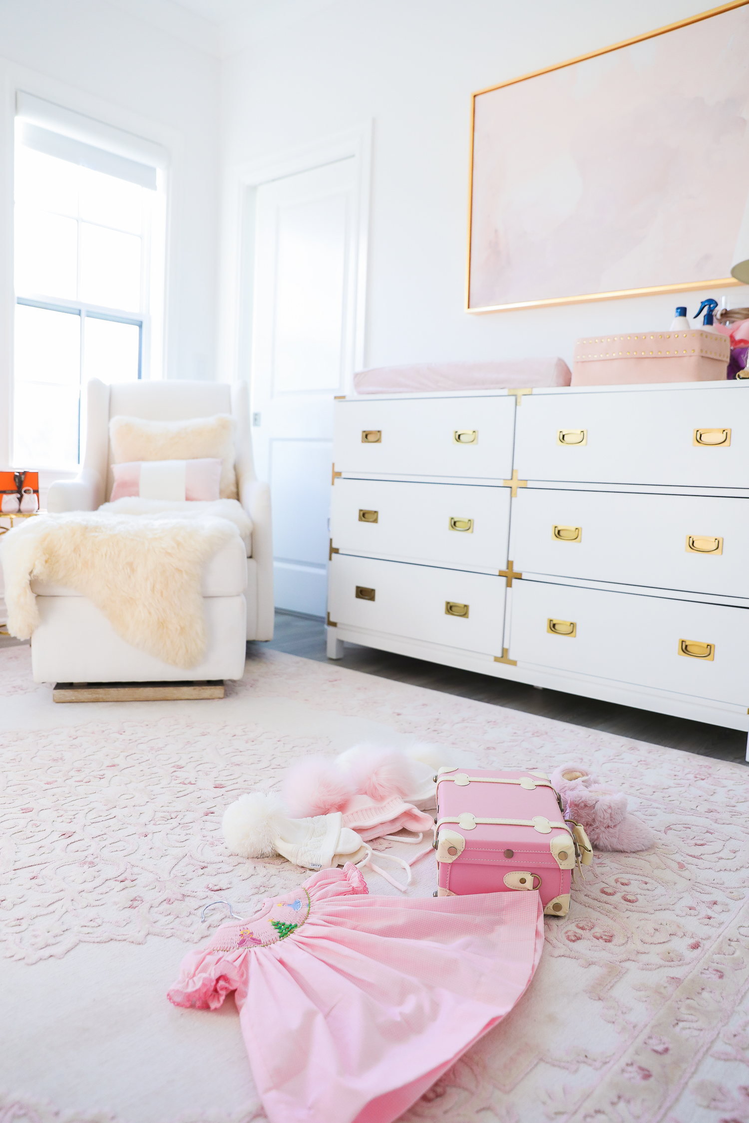 baby girl nursery inspiration christmas pinterest, baby girl nursery christmas tree, emily gemma, gold baby garment rack, the sweetest thing blog-2 |  Sophia’s Baby Girl Nursery at Christmastime by popular Oklahoma life and style blog, The Sweetest Thing: image of a girl nursery decorated with a Nordstrom Nolene Sequin Party Dress, Pottery Barn Kids Merced Glider & Ottoman, Wayfair Piper 2-in-1 Convertible Crib, RH Baby & Child NEW RUFFLE APPLIQUÉD ORGANIC VOILE NURSERY BEDDING COLLECTION, Wayfair Fontanne Oriental Pink/White Area Rug, Overstock Clover 8-light Aged Brass Chandelier, Horchow Sophia Rectangular Dressing Mirror, Etsy ShopAndisList Childrens standard rack, Pottery Barn Kids Raffia Heart Baskets, RH Baby & Child GILT DEMILUNE CANOPY BED CROWN, Walmart Holiday Time Pre-Lit Snow-Flocked Colorado Artificial Christmas Tree, 7', White Lights, Target Wondershop Glitter Deer Decorative Figurine Blush, T.J. Maxx pink velvet storage box, Wayfair Arnulfo 6 Drawer Double Dresser, Nordstrom Nursery Essential Gift Set, Nordstrom Sophie la Girafe Teething Toy, Glamboxes GLAMstand Hair Accessory Organizer, Serena & Lily Jenn Thatcher painting, Pottery Barn Kids Luxe Chamois Changing Pad, Crate & Kids Acrylic Shelf Bookcase, RH Baby and Child ANTIQUED GILT WOOD LETTER, Wayfair Luxe Solid Faux Fur Throw Pillow, Gap Toddler Cable-Knit Pom Beanie, Maisonette SteamLine Luggage *Exclusive* Vanity Case, Smocked Auctions NUTCRACKER SMOCKED BISHOP PINK GINGHAM, Nordstrom Ugg Jesse Bow Fluff Bootie, Overstock Safavieh Couture Carnation Round Tufted Ottoman, Pottery Barn Kids Blush Velvet Nursery Storage, and Nordstrom Chenille Blanket.