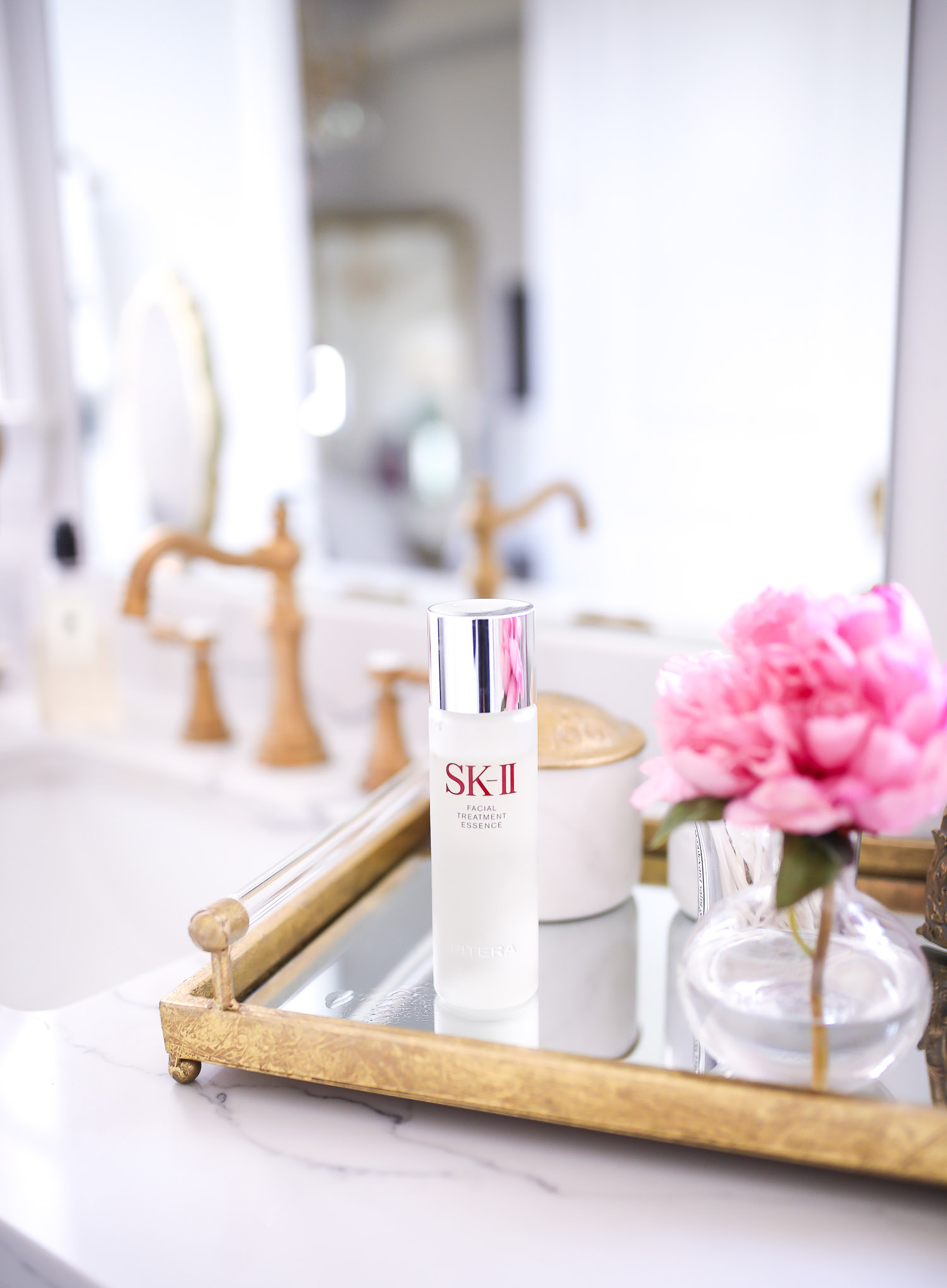 Sephora Spring VIB event april 2020, SKII pitera essence review, emily gemma skincare, beauty blogger | SK II Pitera Essence by popular US beauty blog, The Sweetest Thing: image of a bottle of SK II Pitera Essence.