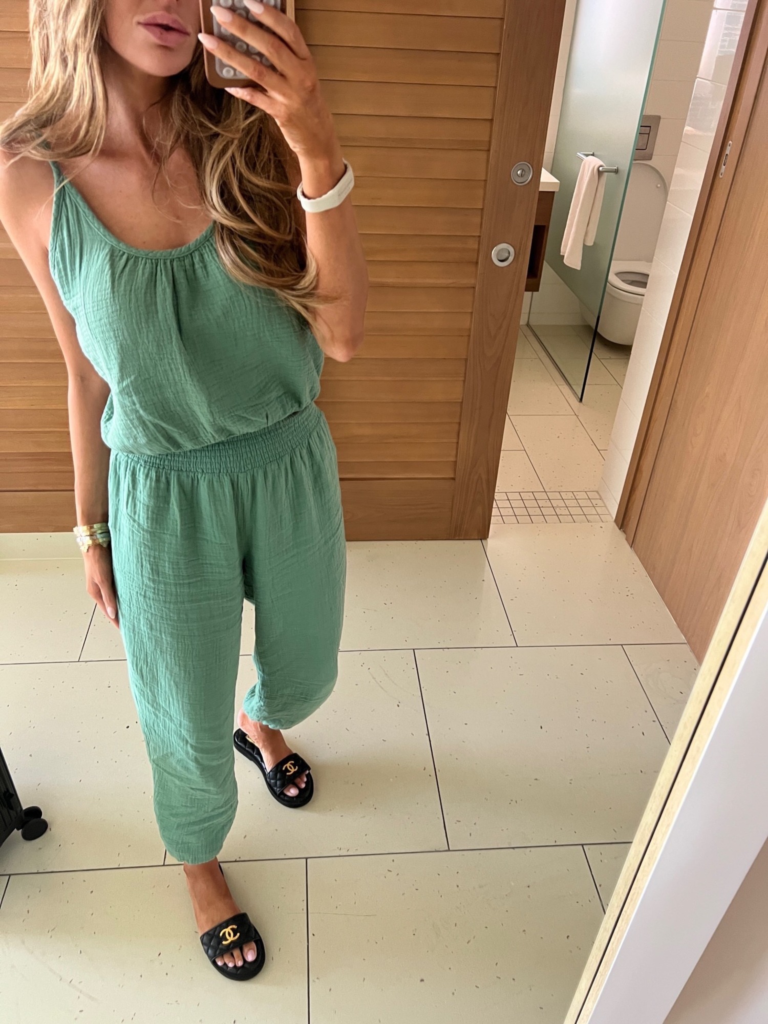 Chanel Summer 2023 Black Quilted Slide Sandals Gold Logo, Airport Outfit Ideas Summer 2023, Emily Ann Gemma