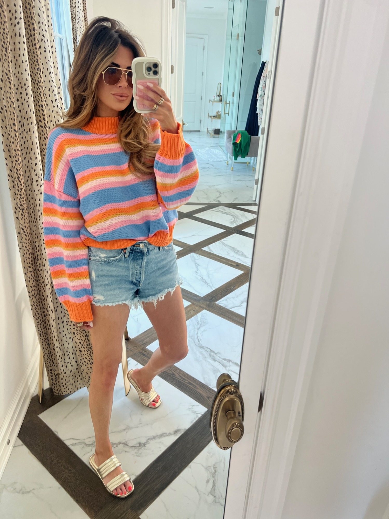 summer fashion, agolde denim shorts, how to style agolde shorts, seychelles sandals, Emily Ann Gemma, casual outfit, summer sweater, pink lily